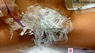 wanna watch this blonde shave her hairy pussy up close?