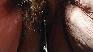 german granny spreads hairy beaver stuffing cucumber deep inside