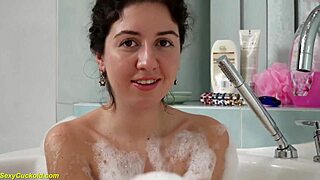 Teen Katty West fingers her tight pussy in bathtub
