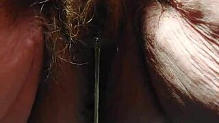 german granny spreads hairy beaver stuffing cucumber deep inside