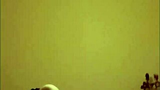 Maitresse K dominates slave in stockings and heels