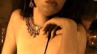 she dances naked by the fire, clothes ripped off in erotic tease