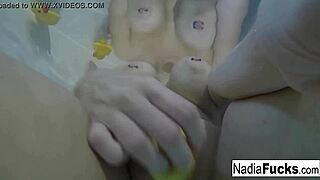 nadia looks so sexy masturbating in the bath with rubber duckies