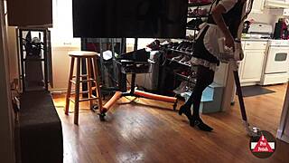 Sexy French maid in stockings and skirt vacuums seductively, upskirt flashing her model curves while cosplaying cleaning lady.