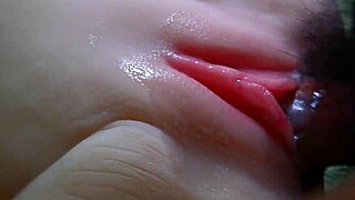 ready for this shaved fuck doll's double anal penetration and handjob close-up?