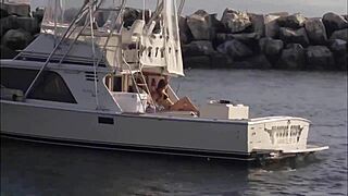 A sexy brunette in bikini cruises the boat in super style