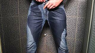 guy soaks jeans with piss then blasts huge cumshot outdoors
