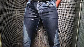 guy soaks jeans with piss then blasts huge cumshot outdoors