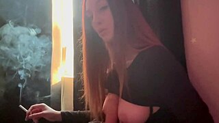 Artemisia smokes cig while plunging dildo deep solo