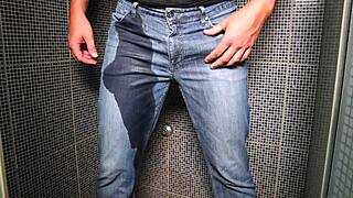 guy soaks jeans with piss then blasts huge cumshot outdoors