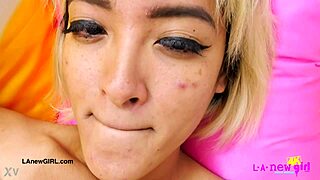 gorgeous asian model teases her horny petite body on sofa