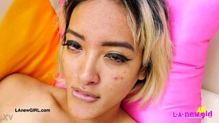 gorgeous asian model teases her horny petite body on sofa