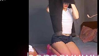 Bonneyuwu masturbates with see-through dildo on bed