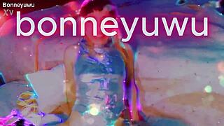 Bonneyuwu masturbates with see-through dildo on bed