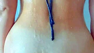 Beautiful tanned latina babe slips into steamy shower for intimate massage