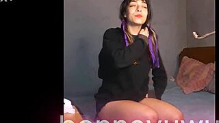 Bonneyuwu masturbates with see-through dildo on bed