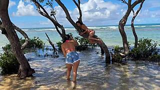 Two sexy latinas kiss and tease big asses on brazilian beach outing