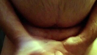 her belly glistens under the shower as cum drips down in steamy aftermath