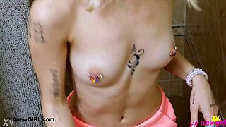 Picture perfect blonde strips down for steamy shower tease