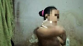 indonesian stw housewife asian with big natural tits and pussy strips naked in shower