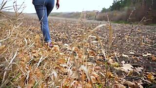 Milf Bends Over In Tight Blue Jeans Teasing Her Juicy Ass Outdoors