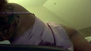 Pink satin clings as wife orgasms hard with dildo toy