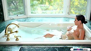 asian teen slips into tub to rub roommate's pussy