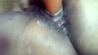 muscular black babe rams huge dildo deep in big pussy solo