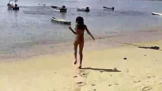 monika fox flaunts pink starry bikini along sun-kissed beach