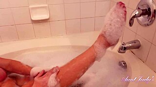 Auntjudys busty hairy milf cameron skye fingers pussy in steamy bath time. 