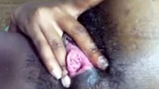 muscular black babe rams huge dildo deep in big pussy solo