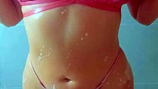 beautiful tanned latina teens shower off beach sand together