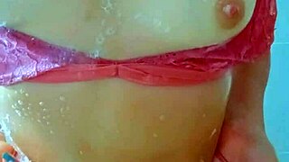 beautiful tanned latina teens shower off beach sand together