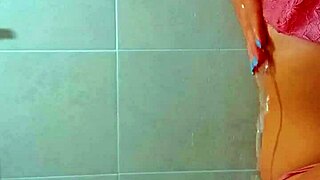 beautiful tanned latina teens shower off beach sand together