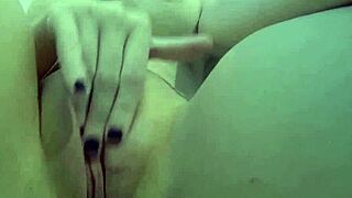 sexy blonde nadia plays with her big tits and ass in bubbly bath