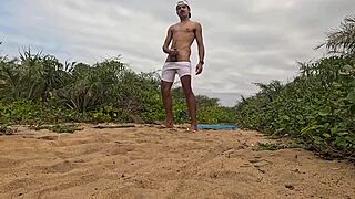 handjob and cumshot action right on the beach