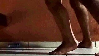 couple fucks passionately on hotel balcony at new year's eve