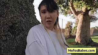 Sexy Asian teen Tomie Tang flashes natural big boobs outdoors—Charles Dera, wanna squeeze?!