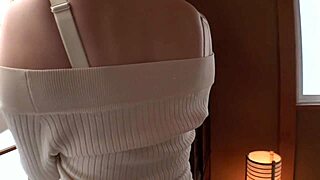 Hey beautiful busty Japanese milf with huge natural tits on the bed