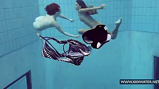 Katrin and Lucy's big tits tease underwater in bikinis!