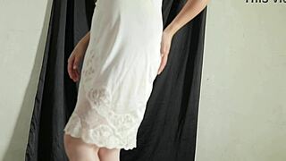 satin dress clings to her huge tits and fat ass as she tries on lingerie in secret