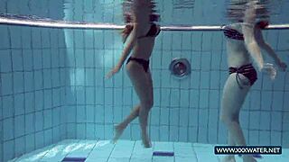 Katrin and Lucy's big tits tease underwater in bikinis!
