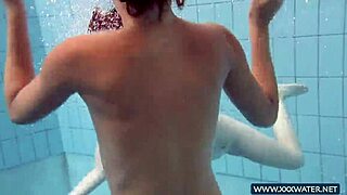 Katrin and Lucy's big tits tease underwater in bikinis!