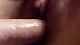 young japanese ftm crossdresser grabs dildo and masturbates wildly to erotic videos in amateur solo play