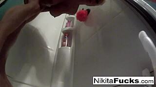 nikita von james strips down for that steamy shower tease