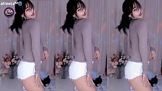 cute korean girl dances sexy with the guys