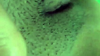 mature alone at home fingers her smooth shaved pussy