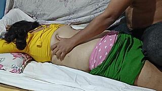 busty desi housewife relaxes into a steamy boob massage