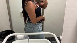 Risky public bathroom finger fuck has this latina teen's juicy clit dripping wet