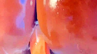 Oiled fat black whore squirts from creamy pussy hammered by huge vibrator dildo